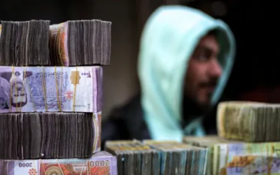 سوريون يحملون نقودهم في أكياس والحكومة تحذف صفرين من الليرة، فما التبعات المتوقعة؟