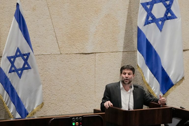 FILE - Bezalel Smotrich, Israeli Minister of Finance, addresses the parliament in Jerusalem, آذار 27, 2023. Israel's finance minister has slammed a decision by the financial ratings agency Moody’s to downgrade Israel’s credit rating. Bezalel Smotrich says the decision “did not include serious economic claims.” In its announcement Friday, Feb. 9, 2024, Moody's warned that the ongoing war in Gaza and a possible war in the north with Hezbollah could adversely affect Israel’s economy. (AP Photo/أيارa Alerruzzo, file)