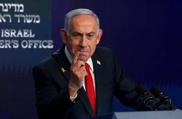 FILE PHOTO: Israeli Prime Minister Benjamin Netanyahu speaks during a press conference, in Jerusalem, أيار 21, 2025. REUTERS/Ronen Zvulun/Pool/File Photo