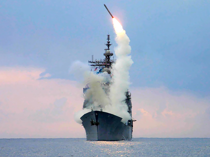 الموسوعة - epa04412737 (FILE) A file handout picture made available by the US Department of Defense (DoD) on 23 آذار 2003 shows a US Navy Tomahawk Land Attack Missile (TLAM) being launched from the guided missile cruiser USS Cape St. George at sea in the Mediterranean Sea. The Pentagon said late 22 أيلول 2014, the United States and allied forces launched airstrikes against Islamic State (IS) militants in Syrian territory for the first time. The military was 'using a mix of fighter, bomber and Tomahawk Land Attack Missiles,' in the ongoing operation. The bombings were the first against Islamic State militants in Syria. The US had previously bombed Islamic State targets in Iraq, but said that it would pursue the group in Syria if necessary. The possibility of expanding airstrikes to Syria has drawn condemnation from Russia and Iran. Syrian President Bashar al-Assad has said he would see any intervention in his country as an act of aggression. EPA/US NAVY/KENNETH MOLL HANDOUT EDITORIAL USE ONLY