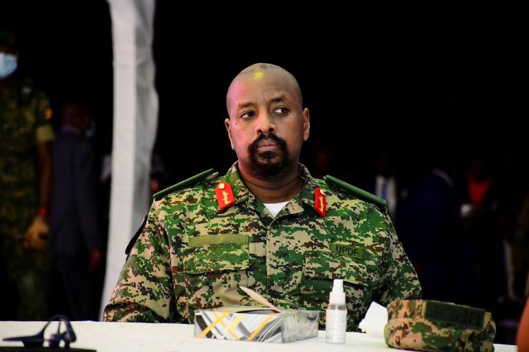 Lt. General Muhoozi Kainerugaba, the son of Uganda's President Yoweri Museveni, who leads the Ugandan army's land forces, looks on during his birthday party in Entebbe, Uganda أيار 7, 2022. REUTERS/Abubaker Lubowa